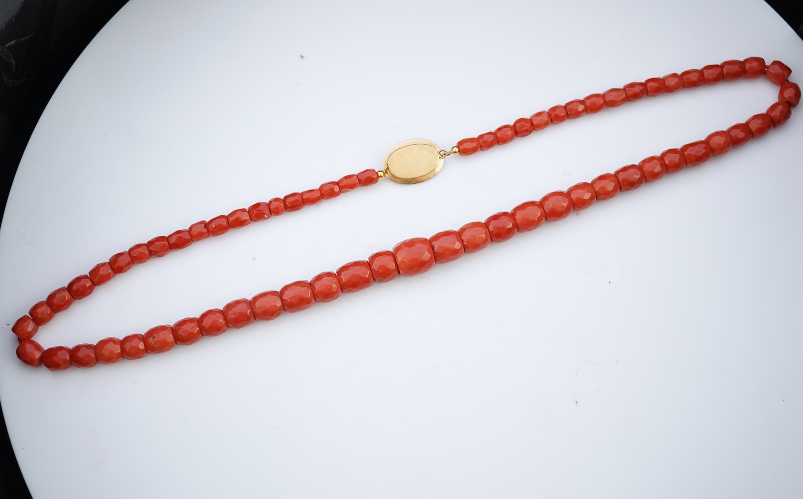 A coral bead necklace, mid 19th century